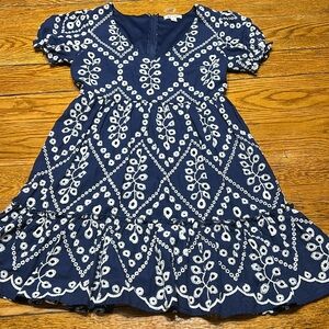 Mi Ami by Francesca’s navy blue with white floral eyelet.  Lined. Size Medium.